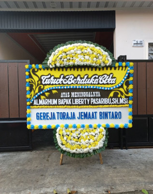 Papan Bunga Duka di Pulau Dullah Selatan